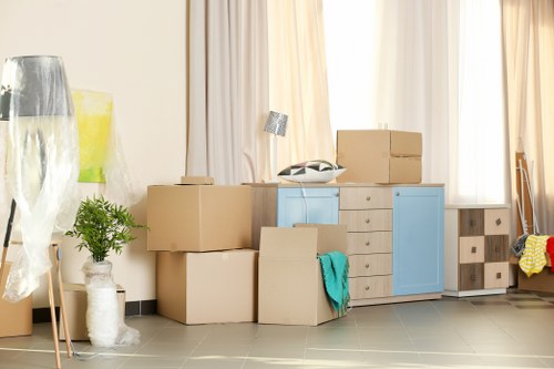 Removal van and moving team preparing a house move in South Hornchurch