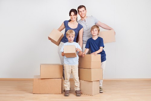 Careful unloading of boxes and furniture at a South Hornchurch property