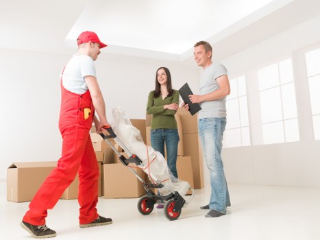 South Hornchurch moving crew loading items carefully into a van
