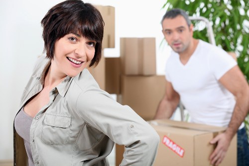 Commercial removals setup with office furniture and equipment
