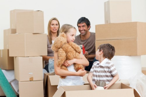 Unpacking boxes and organising rooms in a South Hornchurch property