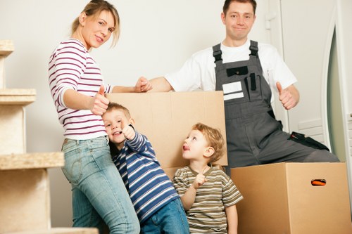 Loading furniture and boxes into a removals van in South Hornchurch